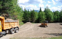 Gravel is purchased to smooth out the surface of our kennel